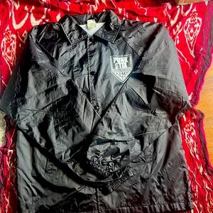 New with no tags . Adult small windbreaker